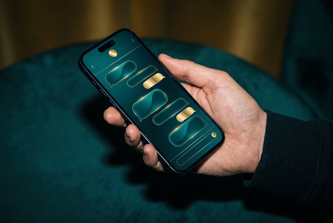 A phone held up showing OBLIQ's private messaging against a night city.